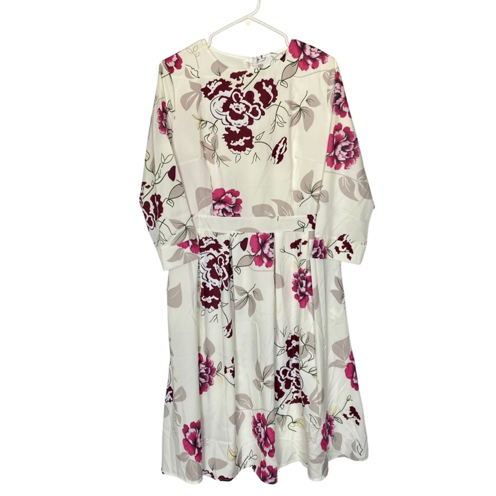 White floral dress with light, breathable fabric. Perfect for date night.